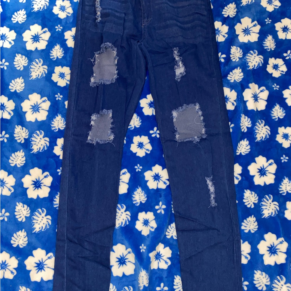 Distressed Blue Jeans